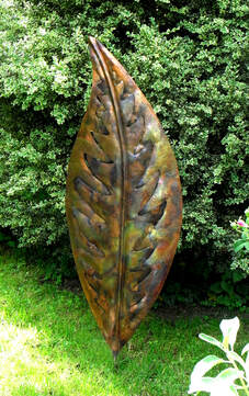 Picture of copper incised leaf form sculpture